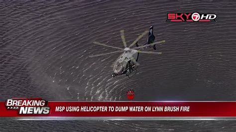 WATCH: Crews use helicopter to dump water on Lynn brush fire